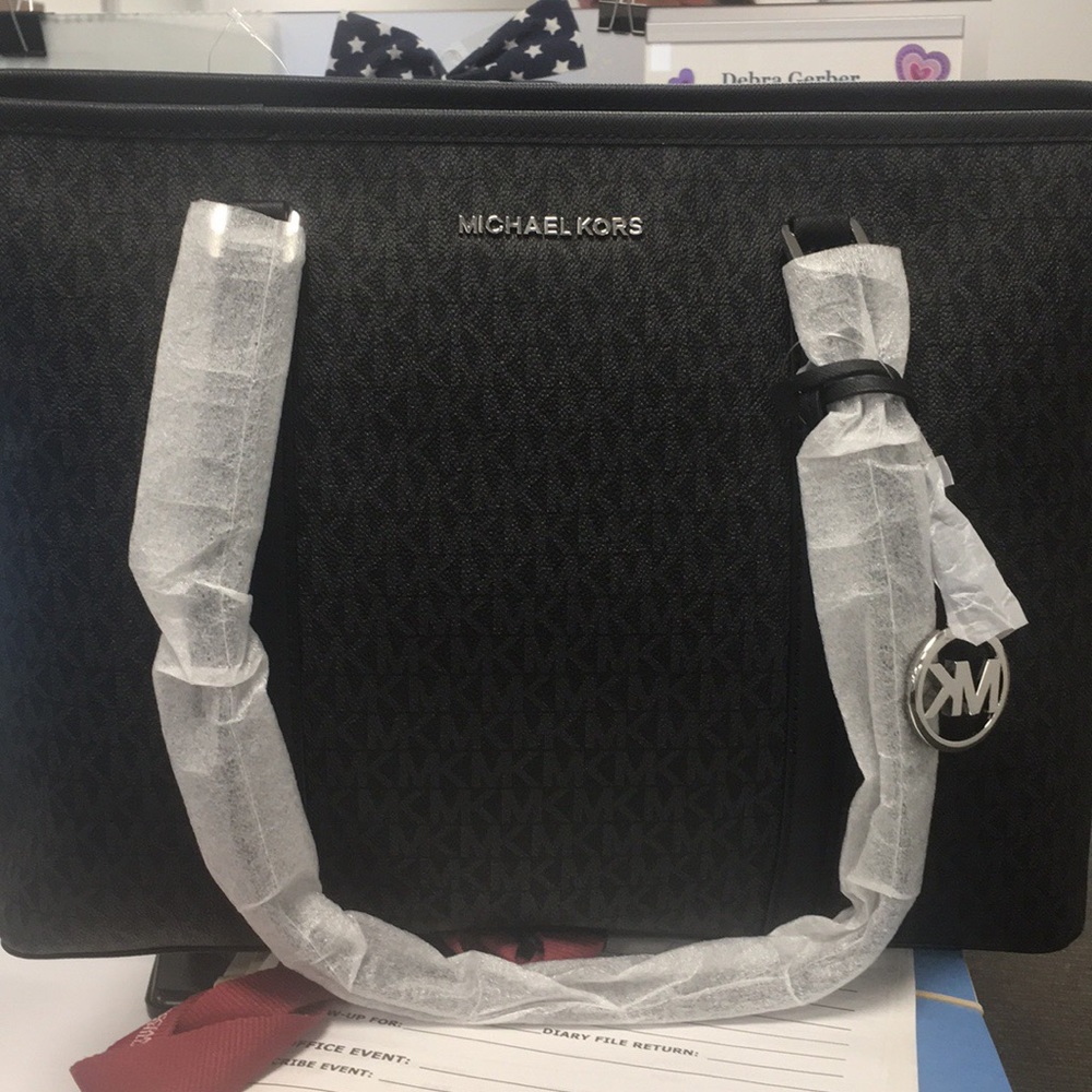 Brand new Michael Kors handbag with tags.